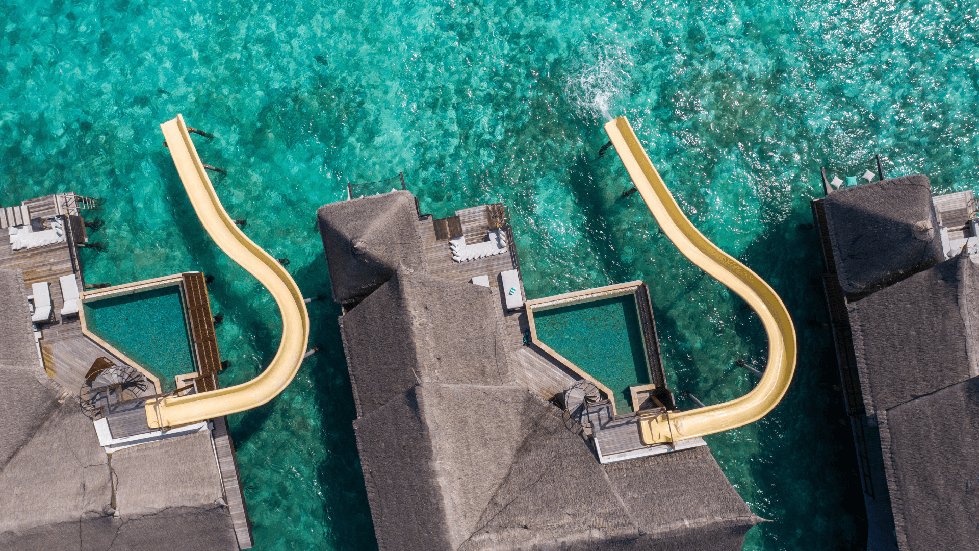 A Look at the Maldives Resorts Known for Water Slide Villas